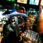 man in front of his family altar